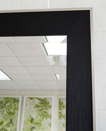 Simple black framed mirror with silver lip