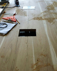 Hudson Table - Custom grommet cuts on two hickory table tops that will be placed next to each other in a conference room