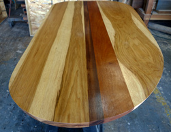 Murphy Table - Asymmetrical table top made from hickory, walnut, mahogany