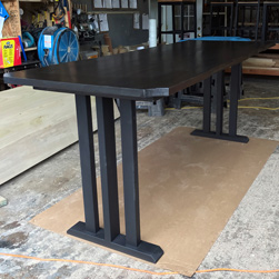 Grapevine Table - Live edge table top in black walnut finish on black trestle base