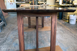 Victoria Table - Walnut table top with bevel cut on the underside and custom walnut base