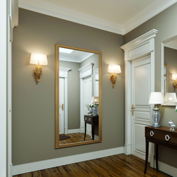 Large entrance mirror with gold frame entry