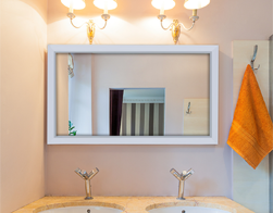 White framed bathroom mirror