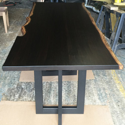 Frisco Table - Rustic bronze live edge table top on black base