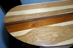 Murphy Table - Asymmetrical table top made from hickory, walnut, mahogany