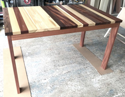 Pierson Table - Tabletop with random stripes of walnut, poplar, mahogany on mahogany base