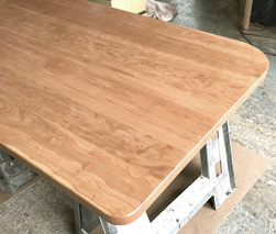 Atlanta Table - Cherry table top with round corners in different sizes of radius requested by customer