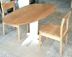 Buford Table - Asymmetrical cherry table top on white pedestal base and matching chairs