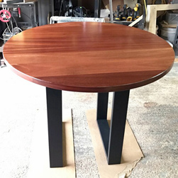 Reno Table - Round mahogany table with black base