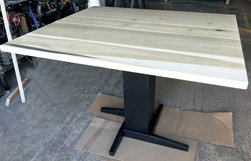 Cleveland Table - Poplar table top in clear finish with black pedestal base
