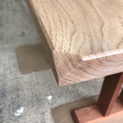 Aurora Table - Corner bevel cut on red oak table top