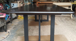 Bronx Table - Black walnut finish table top with bullnose edges on black base