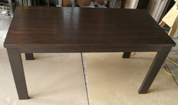 Boston Table - Bronze walnut finish table with based reversed to accommodate two end chairs