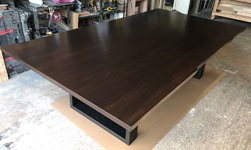 Richardson Table - Large bronze walnut table with live edge cut on black base