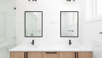 Custom framed mirror panels with black frames