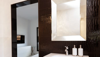 Custom sized bathroom mirror with gold frame