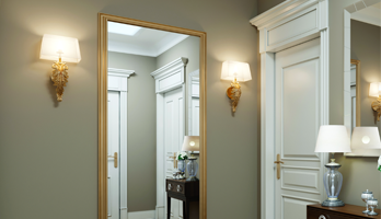 Large entrance mirror with gold frame entry