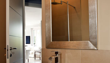 Contemporary gold and silver framed mirror