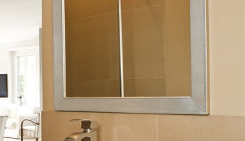 Bathroom mirror with stainless silver frame