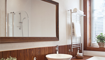 Custom bathroom mirror with wood frame